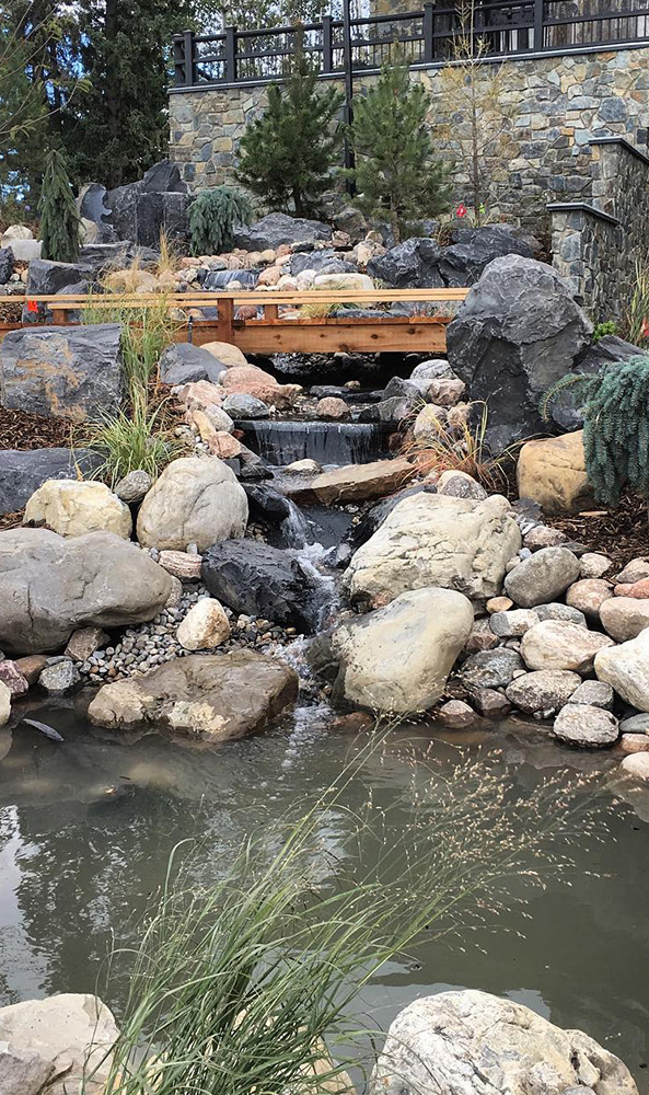 riverbed landscaping pond with boulders